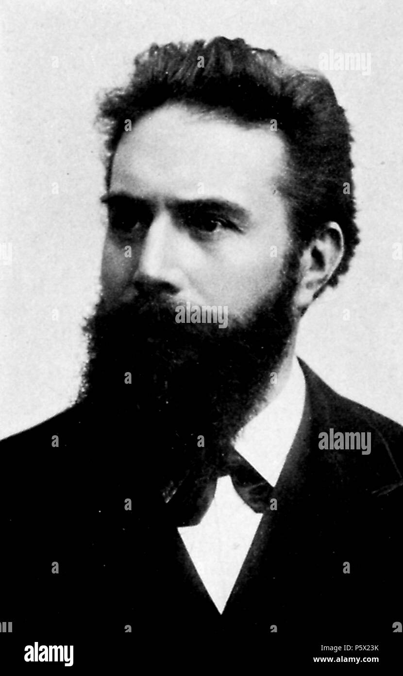Black and white, headshot photograph of scientist, and discoverer of the X-ray, Wilhelm (or Willam) Conrad Rontgen, with a bushy beard, and wearing a dark suit, looking off camera, in three-quarter profile view, from the volume 'Dental and Oral Radiography: a text book for students and practitioners of dentistry, ' authored by James David McCoy, and published in St Louis by Mosby, Germany, 1916. Courtesy Internet Archive. () Stock Photo