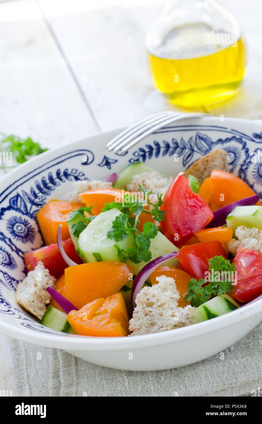 Fresh vegetables Tuscan salad Panzanella, Salad in a Bowl Stock Photo