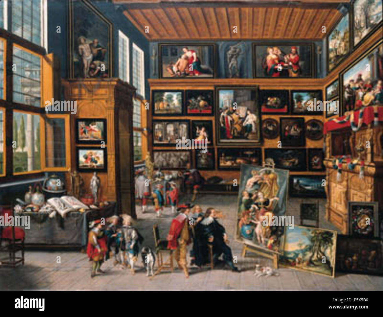 English A spacious entrance hall the walls hung with pictures