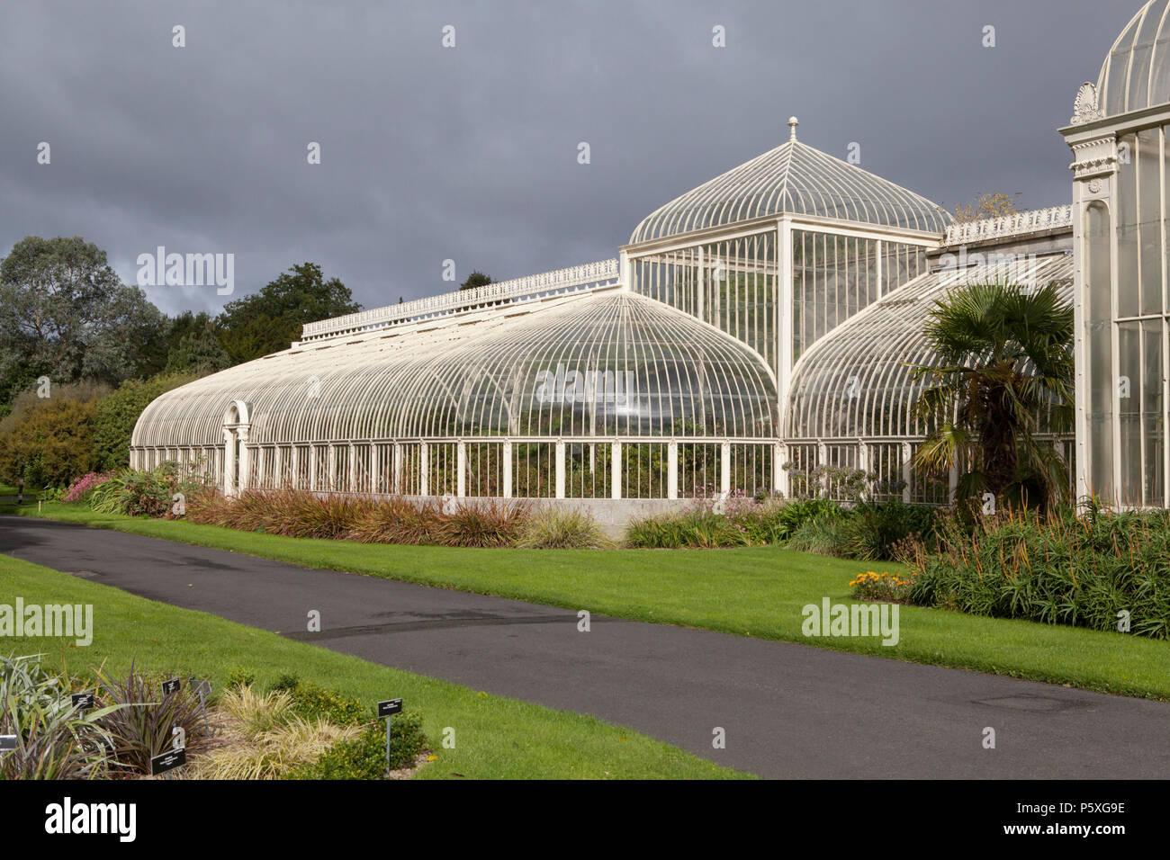 The Curvilinear range of glasshouses at the National Botanic Gardens of Ireland, located at Glasnevin in Dublin Stock Photo