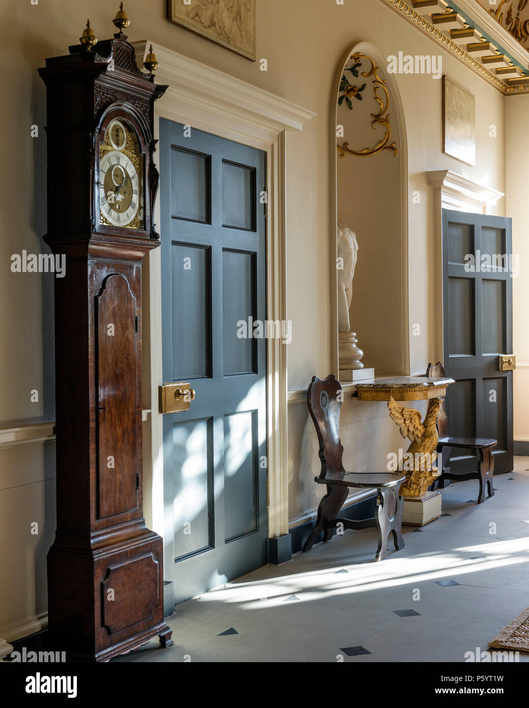 Antique clock in hallway Stock Photo Alamy