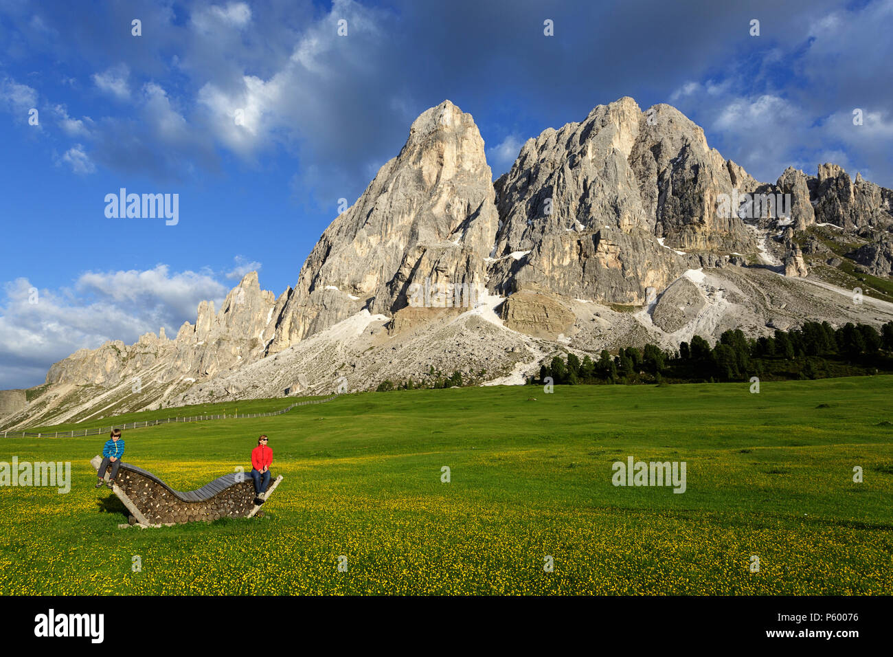Rear view of a Boy hiking along mountain path Stock Photo - Alamy