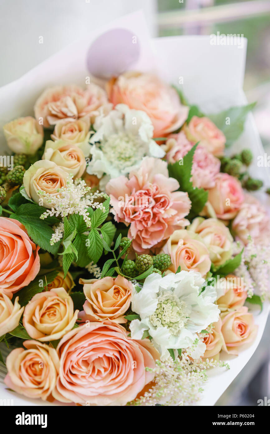 Work Florist Beautiful Spring Bouquet Arrangement With Mix Flowers The Concept Of A Flower Shop A Small Family Business Color Light Peach And Orange Stock Photo Alamy