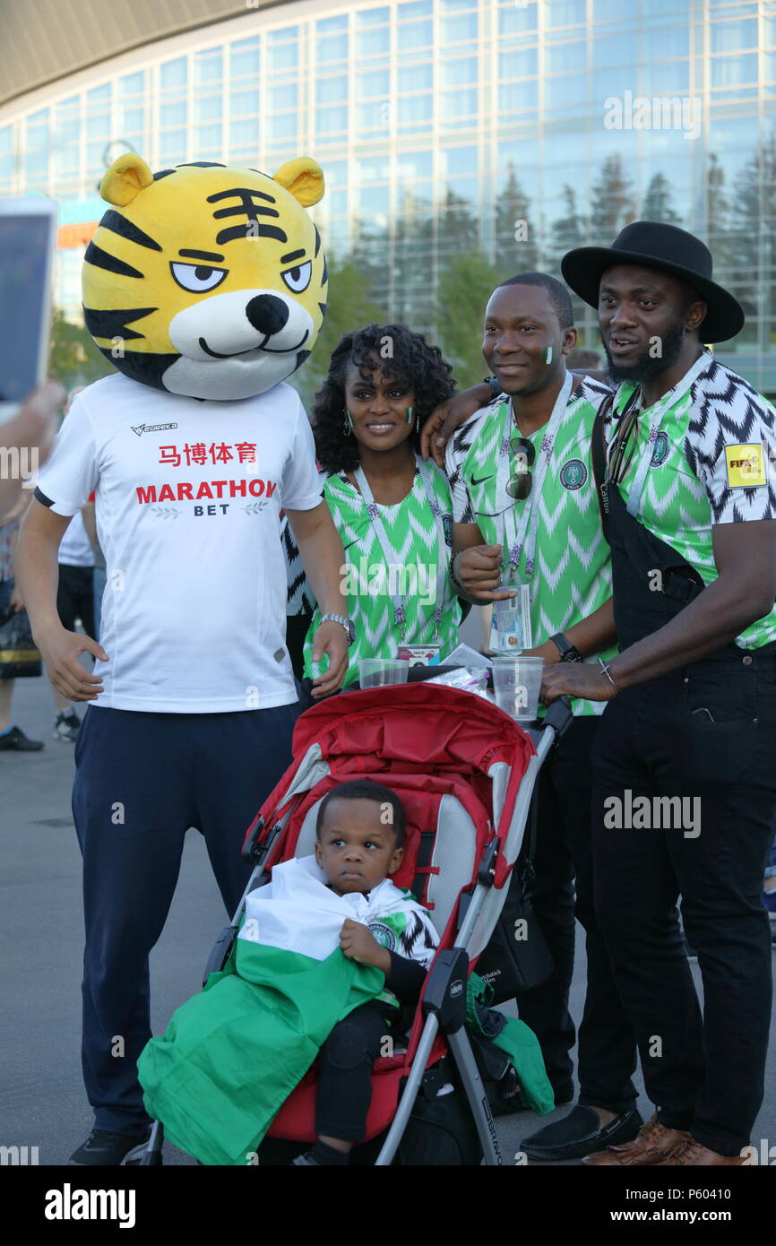 St. Petersburg, Russia - June 26, 2018: Nigerian football fans with children going to Saint Petersburg stadium to support their team in the match of F Stock Photo