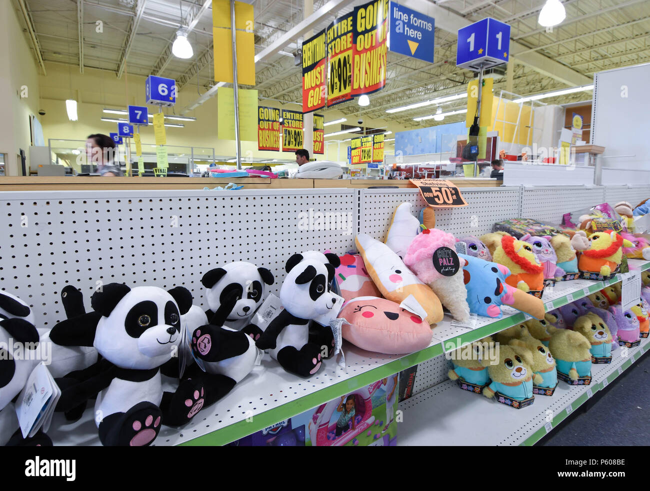 Stuffed animals sit untouched in a Toys R Us store in Manchester, N.H., USA, during its liquidation sale on June 25, 2018. Stock Photo