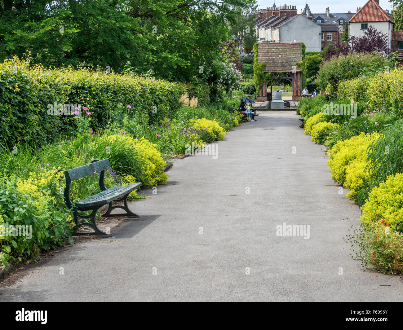 Central path between herbaceous borders in Rowntree Park York Yorkshire England Stock Photo