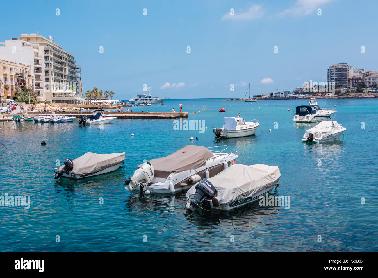 Rowing boats, yachts and cabin cruisers in Spinola Bay, St. Julian's