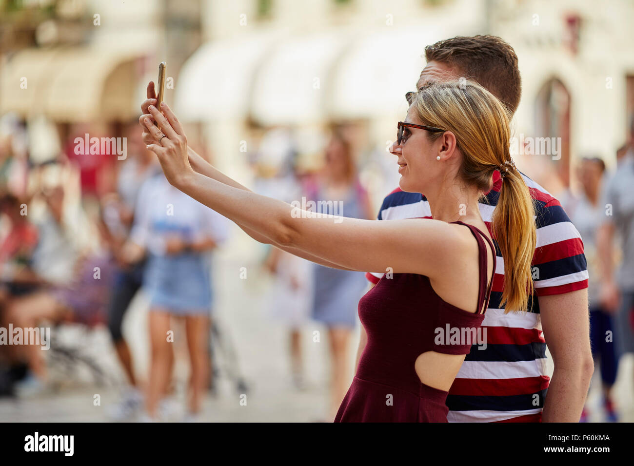 Tourists taking a selfie in Kotor Old town Montenegro Stock Photo