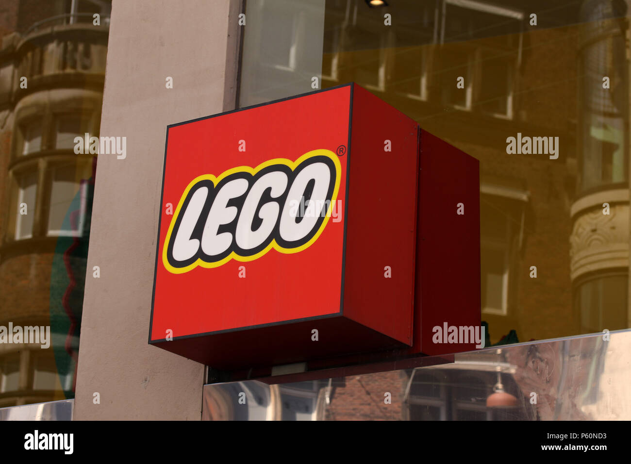 Copenhagen, Denmark - June 26, 2018: Lego logotype sign on shop. Lego is a line of plastic construction toys manufactured by The Lego Group, a company Stock Photo
