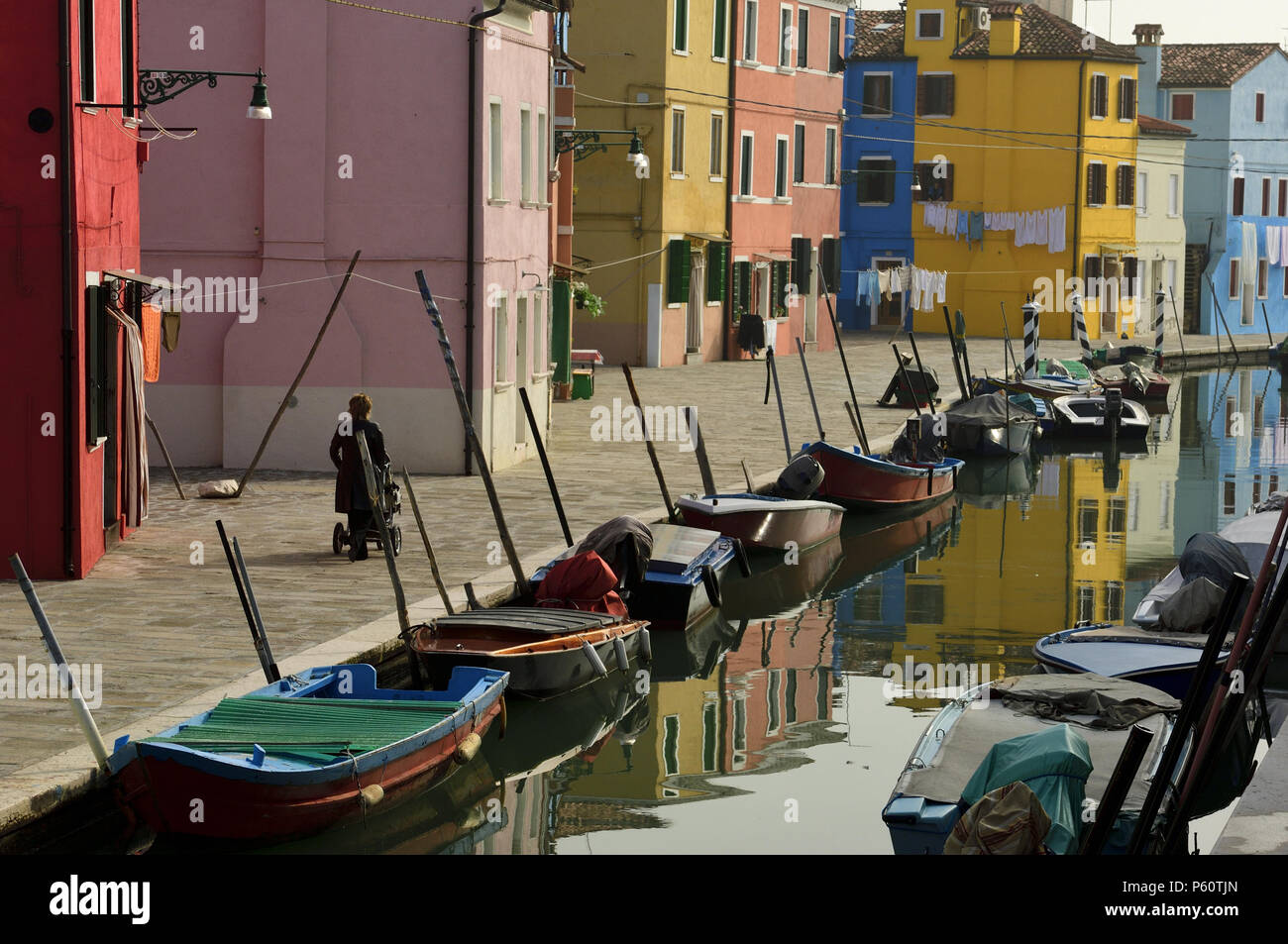 Colorful urban scene along one of the many canals in the Commune di Venezia and Centro Storico areas of Venice, Italy, on October 25, 2005. Stock Photo