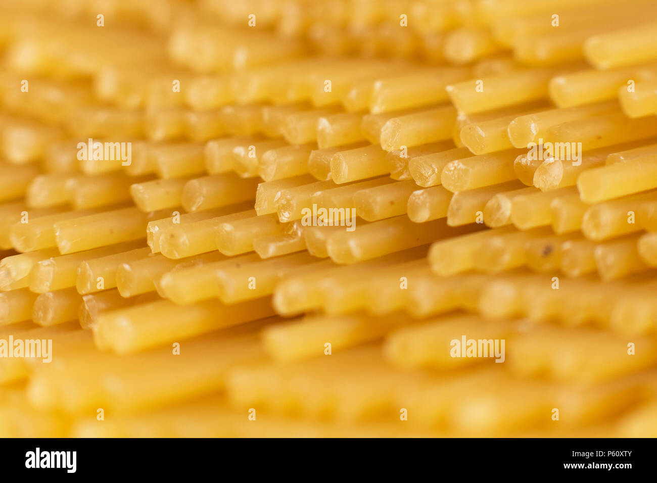 spaghetti tied with a brown thread. On a white background Stock Photo ...