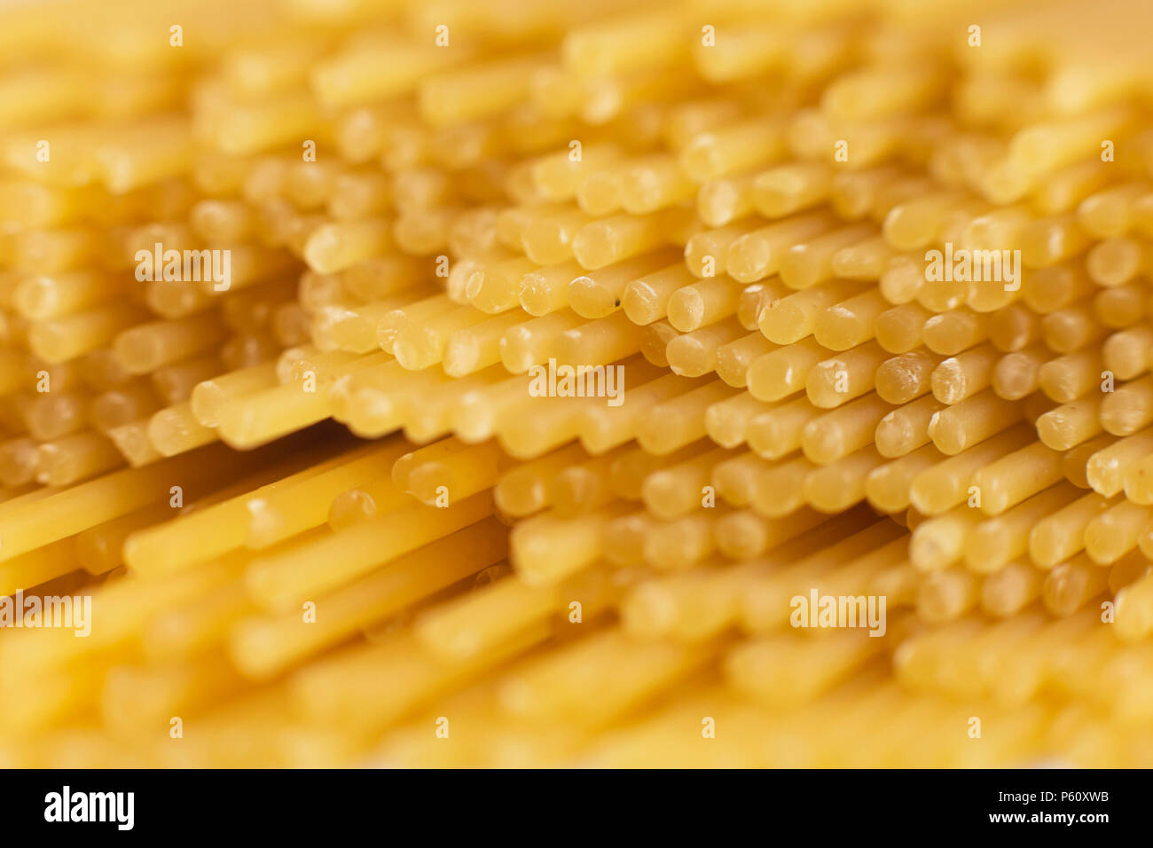 spaghetti tied with a brown thread. On a white background Stock Photo ...
