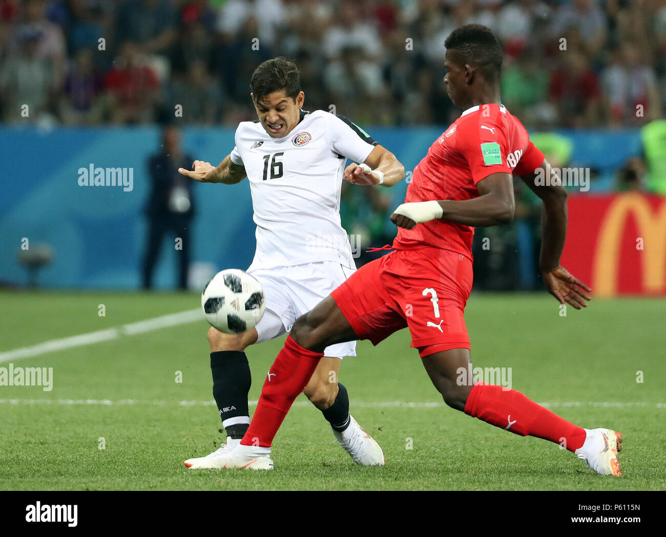 Nizhny Novgorod, Russia. 27th June, 2018. Breel Embolo (R) of Switzerland vies with Cristian Gamboa of Costa Rica during the 2018 FIFA World Cup Group E match between Switzerland and Costa Rica in Nizhny Novgorod, Russia, June 27, 2018. Credit: Ye Pingfan/Xinhua/Alamy Live News Stock Photo