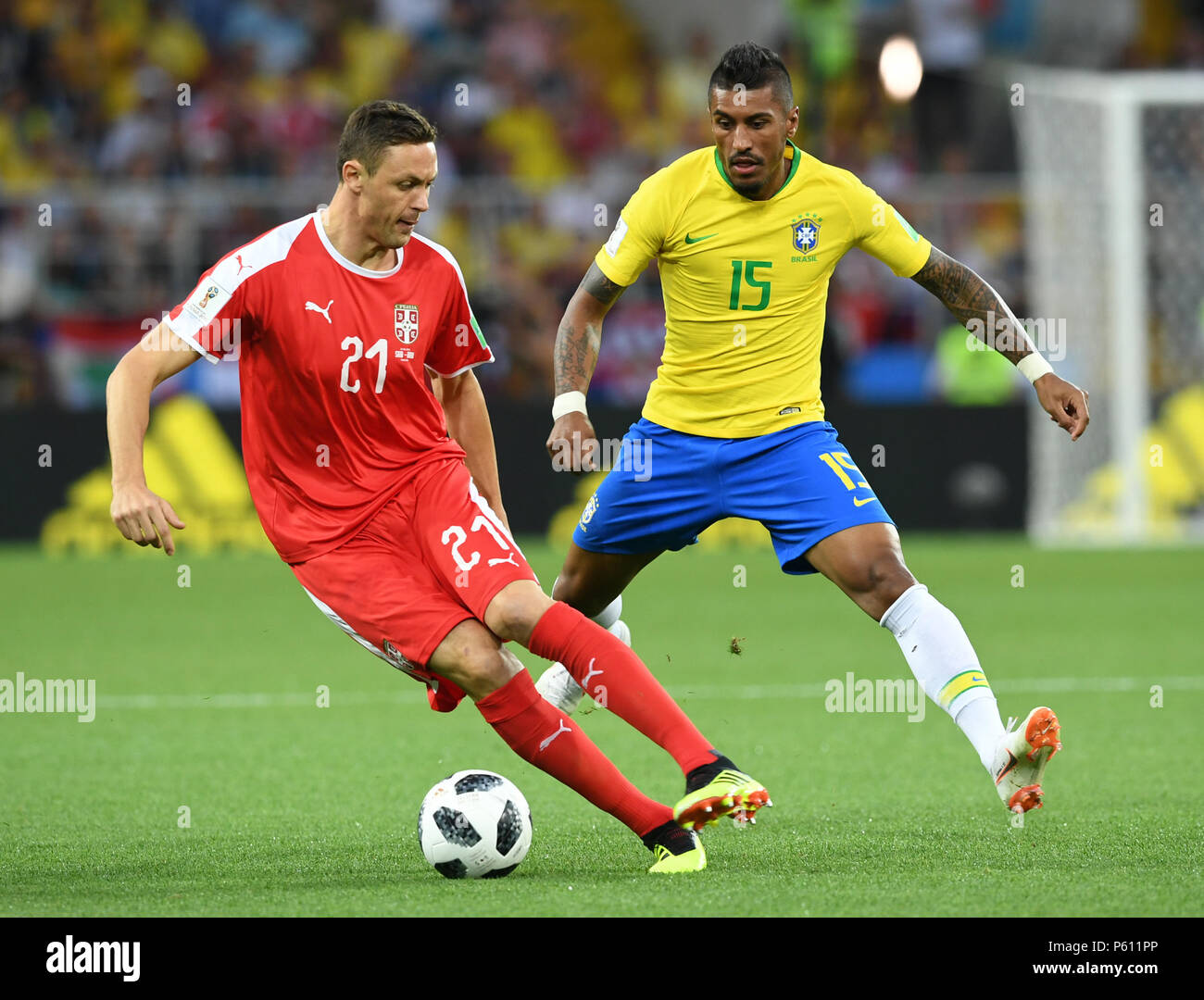 Moscow, Russia. 27th June, 2018. Paulinho (R) of Brazil vies with Nemanja Matic of Serbia during the 2018 FIFA World Cup Group E match between Brazil and Serbia in Moscow, Russia, June 27, 2018. Credit: Du Yu/Xinhua/Alamy Live News Stock Photo