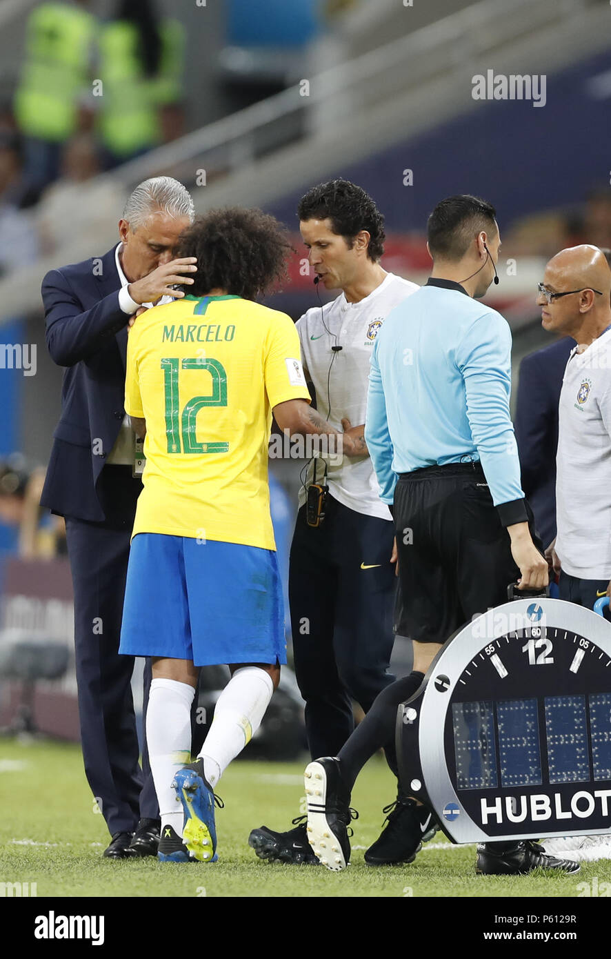 Moscow, Russia. 27th June, 2018. Marcelo (2nd L) of Brazil is substituted off after his injury during the 2018 FIFA World Cup Group E match between Brazil and Serbia in Moscow, Russia, June 27, 2018. Credit: Cao Can/Xinhua/Alamy Live News Stock Photo