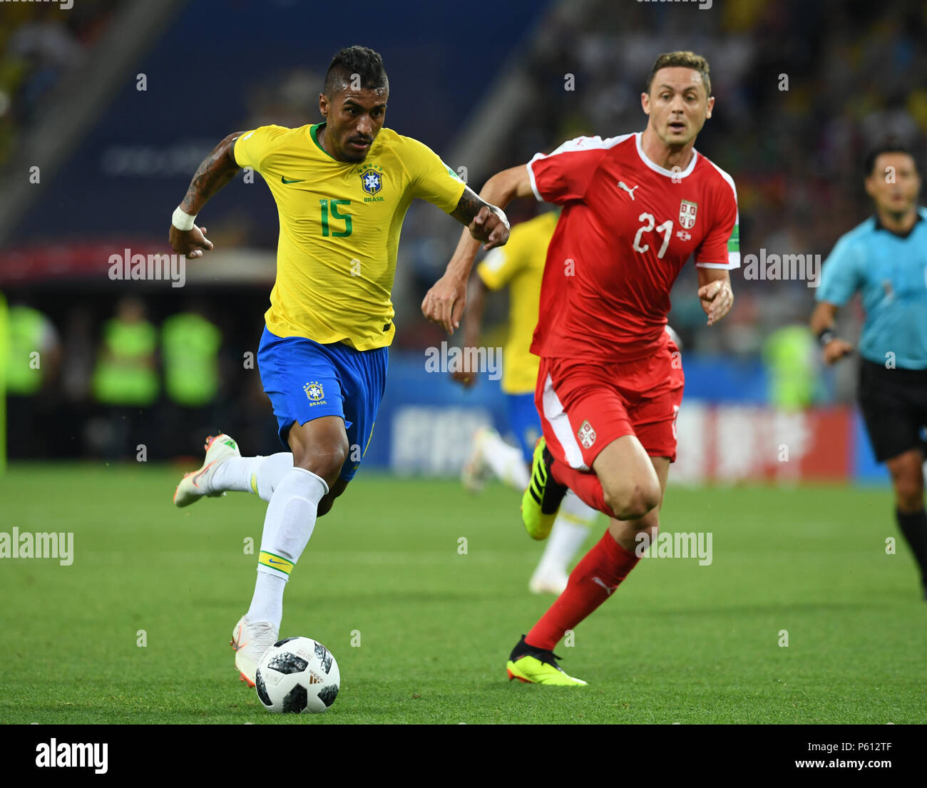 Moscow, Russia. 27th June, 2018. Paulinho (L) of Brazil vies with Nemanja Matic of Serbia during the 2018 FIFA World Cup Group E match between Brazil and Serbia in Moscow, Russia, June 27, 2018. Credit: Du Yu/Xinhua/Alamy Live News Stock Photo