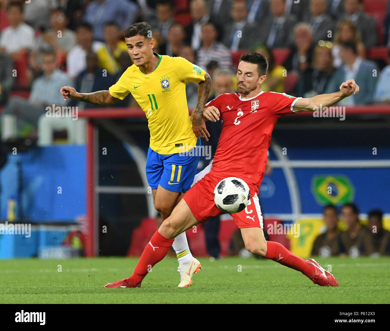 Moscow, Russia. 27th June, 2018. Philippe Coutinho (L) of Brazil vies with Antonio Rukavina of Serbia during the 2018 FIFA World Cup Group E match between Brazil and Serbia in Moscow, Russia, June 27, 2018. Credit: Du Yu/Xinhua/Alamy Live News Stock Photo