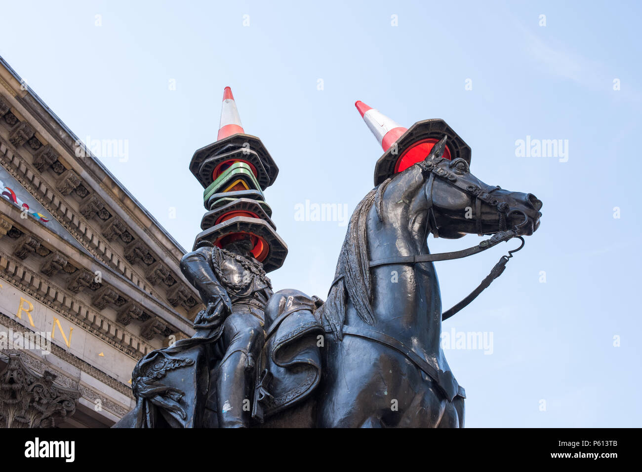 Glasgow, UK. 27th Jun, 2018. UK Weather: Quirky tourist attraction the Duke of Wellington statue gets extra cones on its head in the summer sunshine Credit: Tony Clerkson/Alamy Live News Stock Photo
