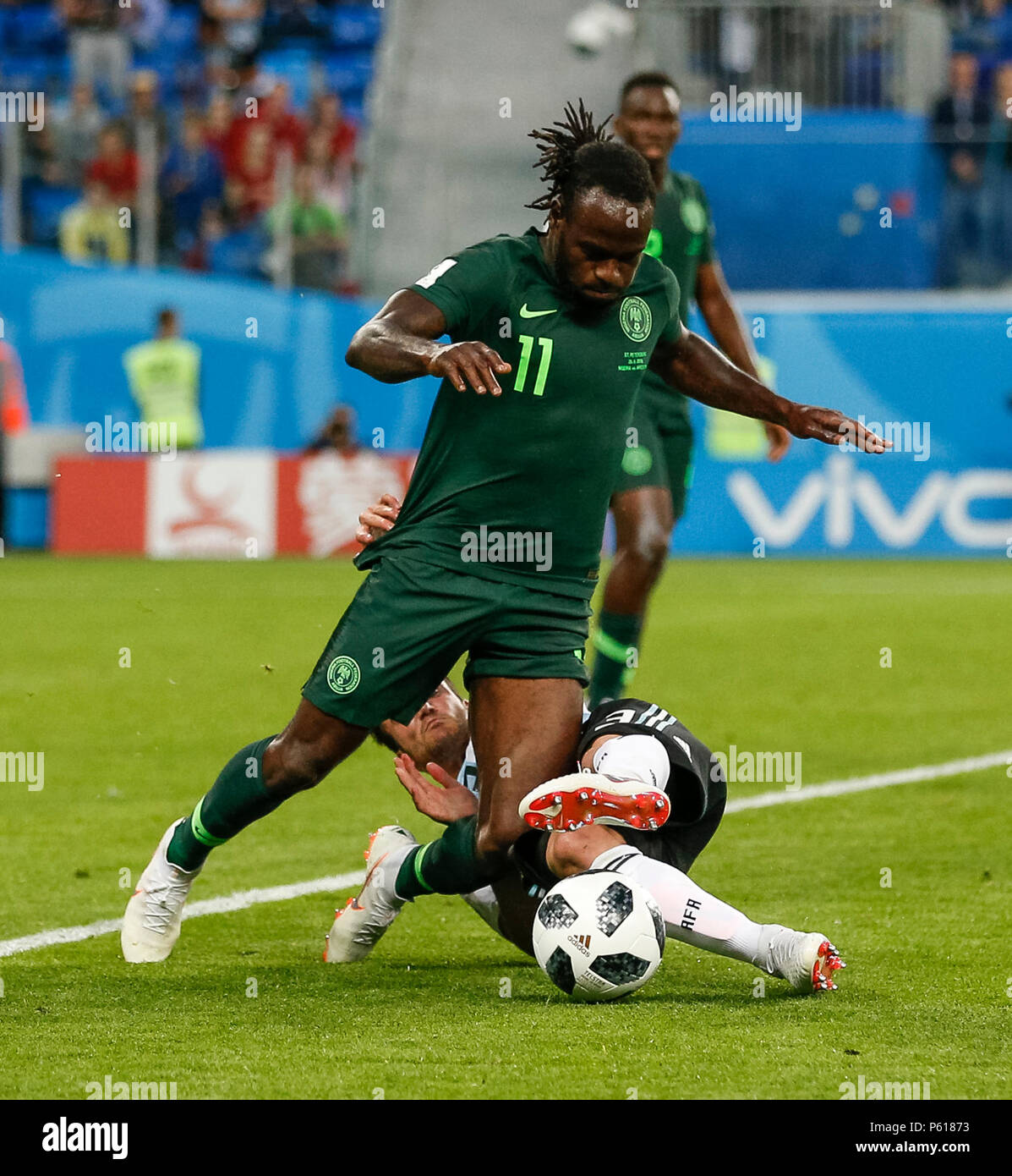 St Petersburg, Russia. 26th Jun, 2018. Victor Moses of Nigeria is tackled by Nicolas Tagliafico of Argentina during the 2018 FIFA World Cup Group D match between Nigeria and Argentina at Saint Petersburg Stadium on June 26th 2018 in Saint Petersburg, Russia. (Photo by Daniel Chesterton/phcimages.com) Credit: PHC Images/Alamy Live News Stock Photo