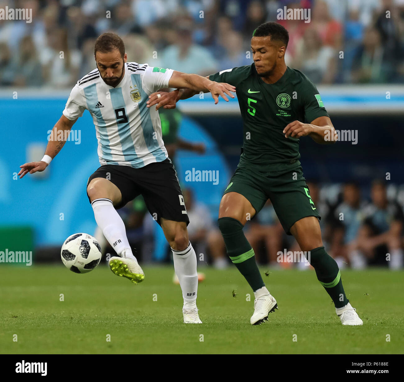 St Petersburg, Russia. 26th Jun, 2018. Gonzalo Higuain of Argentina and William Troost-Ekong of Nigeria during the 2018 FIFA World Cup Group D match between Nigeria and Argentina at Saint Petersburg Stadium on June 26th 2018 in Saint Petersburg, Russia. (Photo by Daniel Chesterton/phcimages.com) Credit: PHC Images/Alamy Live News Stock Photo