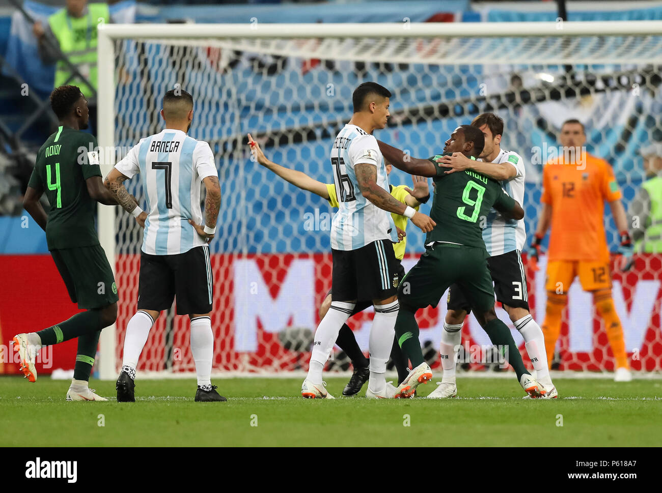 St Petersburg, Russia. 26th Jun, 2018. Marcos Rojo of Argentina and Odion Ighalo of Nigeria clash during the 2018 FIFA World Cup Group D match between Nigeria and Argentina at Saint Petersburg Stadium on June 26th 2018 in Saint Petersburg, Russia. (Photo by Daniel Chesterton/phcimages.com) Credit: PHC Images/Alamy Live News Stock Photo