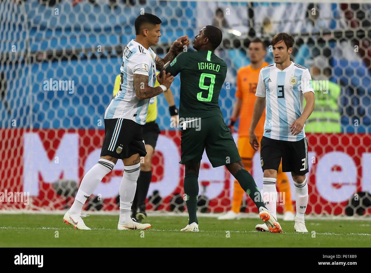 St Petersburg, Russia. 26th Jun, 2018. Marcos Rojo of Argentina and Odion Ighalo of Nigeria clash during the 2018 FIFA World Cup Group D match between Nigeria and Argentina at Saint Petersburg Stadium on June 26th 2018 in Saint Petersburg, Russia. (Photo by Daniel Chesterton/phcimages.com) Credit: PHC Images/Alamy Live News Stock Photo
