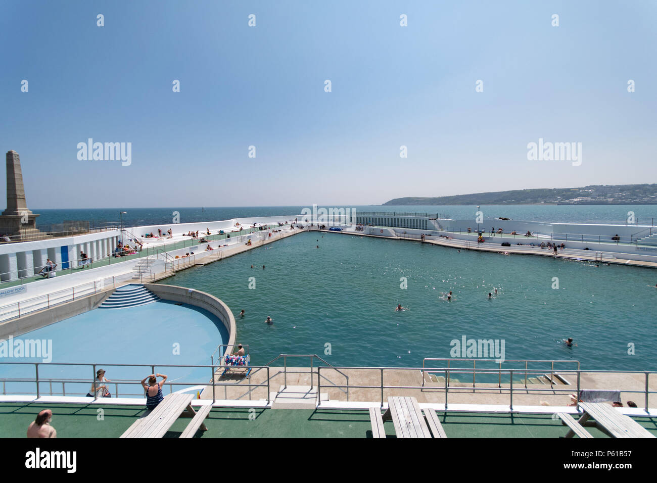 Penzance, Cornwall, UK. 28th June 2018. UK Weather. The Outdoor Jubilee 'Lido' pool, was an ideal cooling off spot for locals and visitors to Penzance this afternoon. Credit: cwallpix/Alamy Live News Stock Photo