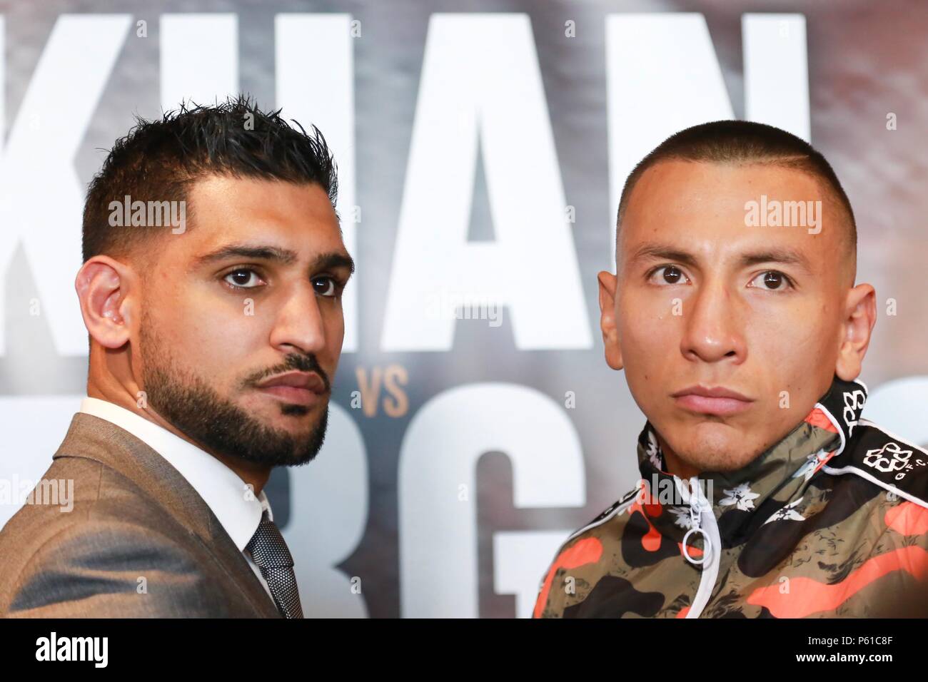 Birmingham, UK. 28th June, 2018. Welterweight boxer Amir Khan comes face to face with Samuel Vargas his next opponent, ahead of the fight at the Arena Birmingham on September 8th, 2018. Peter Lopeman/Alamy Live News Stock Photo