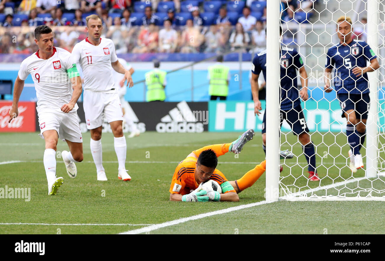 Volgograd, Russia. 28th June, 2018. Japan's goalkeeper Eiji Kawashima (bottom) defends during the 2018 FIFA World Cup Group H match between Japan and Poland in Volgograd, Russia, June 28, 2018. Credit: Wu Zhuang/Xinhua/Alamy Live News Stock Photo
