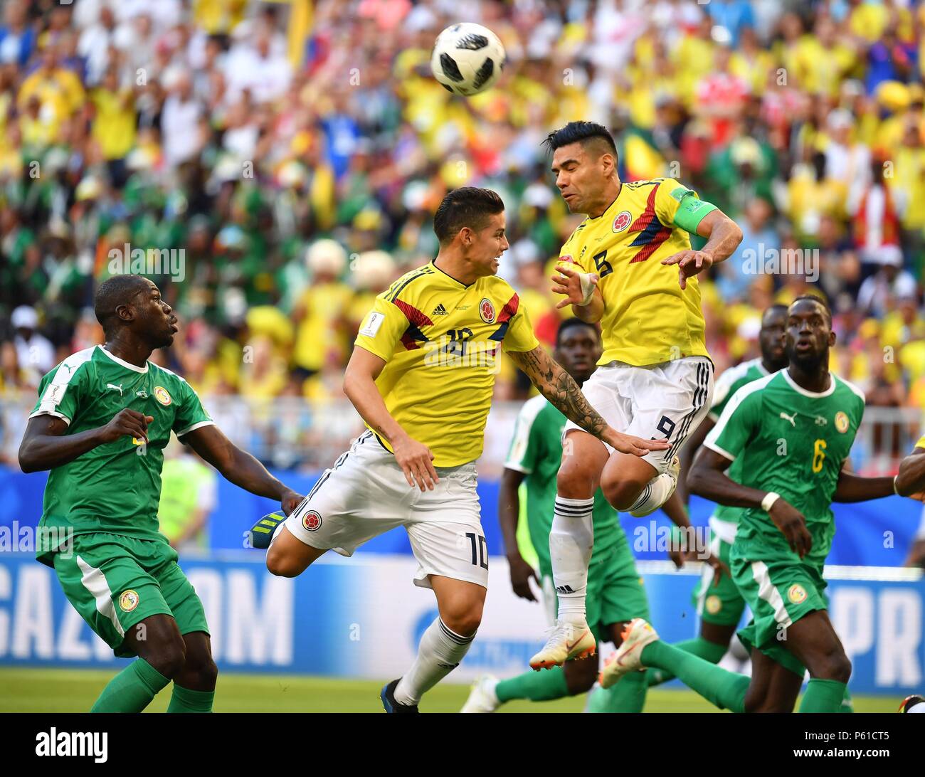 Samara, Russia. 28th June, 2018. Radamel Falcao (2nd R) competes for a header during the 2018 FIFA World Cup Group H match between Colombia and Senegal in Samara, Russia, June 28, 2018. Credit: Liu Dawei/Xinhua/Alamy Live News Stock Photo