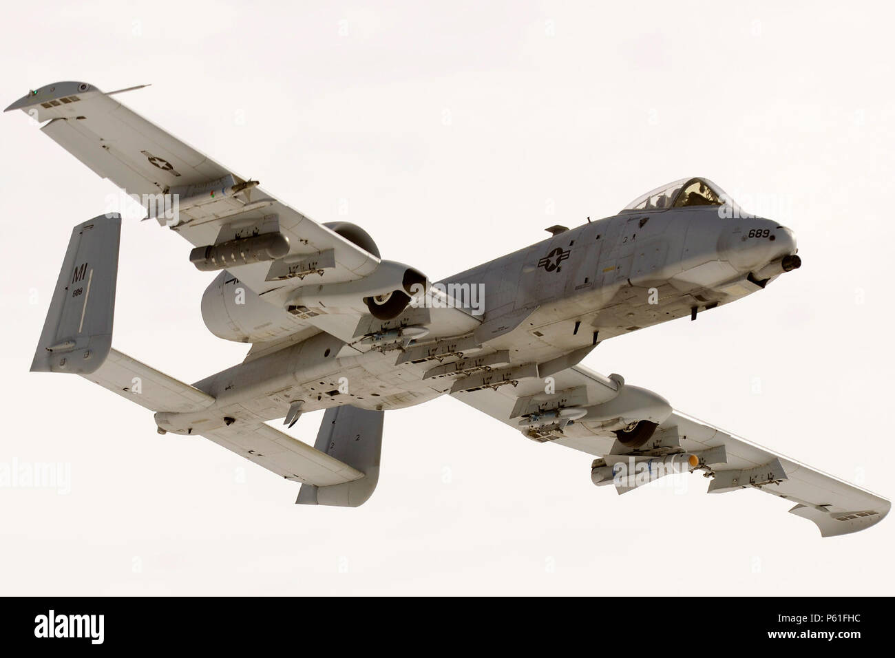 An A-10 Thunderbolt II engages in training mission at the Grayling Aerial Gunnery Range near Waters, Mich., April 7, 2016. The A-10 is operated by the 107th Fighter Squadron of the Michigan Air National Guard and are based at Selfridge Air National Guard Base, Mich. (U.S. Air National Guard photo by Master Sgt. David Kujawa) Stock Photo