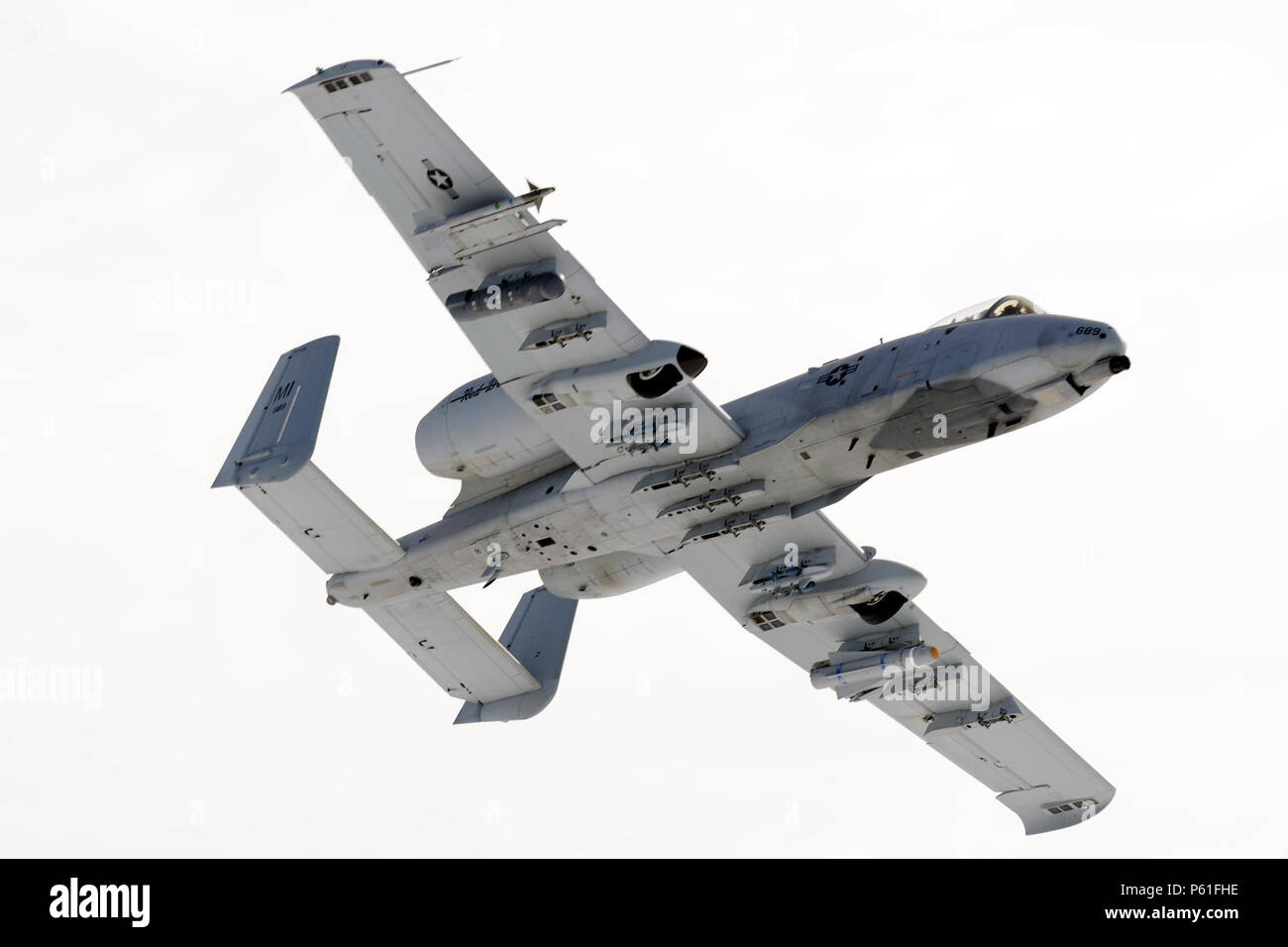 An A-10 Thunderbolt II engages in a training mission at the Grayling Aerial Gunnery Range near Waters, Mich., April 7, 2016. The A-10 is operated by the 107th Fighter Squadron of the Michigan Air National Guard and are based at Selfridge Air National Guard Base, Mich. (U.S. Air National Guard photo by Master Sgt. David Kujawa) Stock Photo