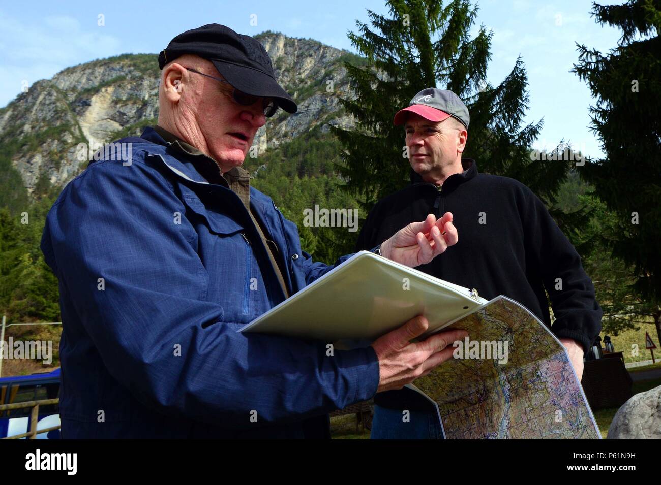 Dr. Andrew Morris (left), U.S. Army Europe's chief historian, explains the  history of World War I's battles of Caporetto and Longarone, which Erwin  Rommel led, to Lt. Gen. Ben Hodges, commanding general,