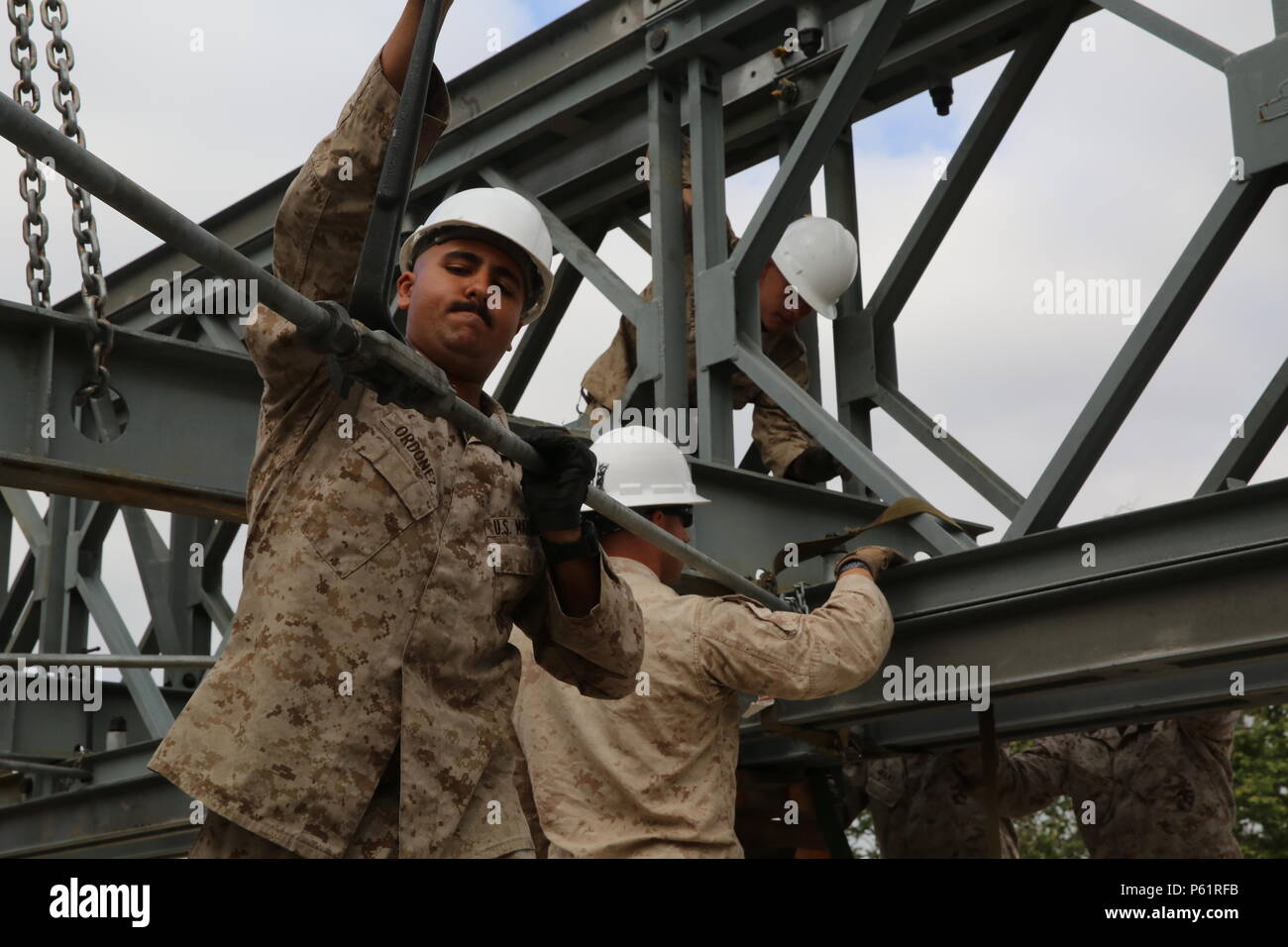 MARINE CORPS BASE CAMP PENDLETON, Calif. Cpl. Jared Ordonez tightens