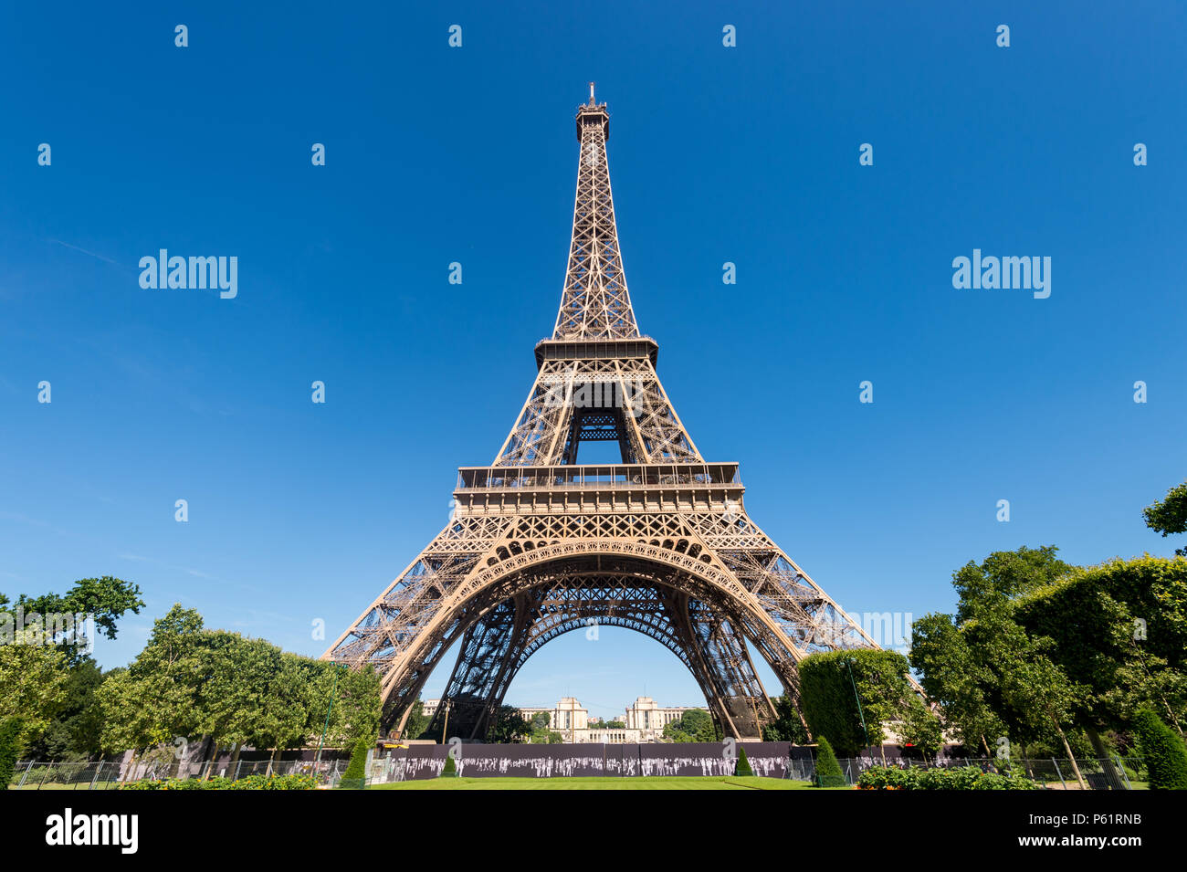 Paris, France - 23 June 2018: Eiffel Tower from the Champ de Mars gardens in summer. Stock Photo