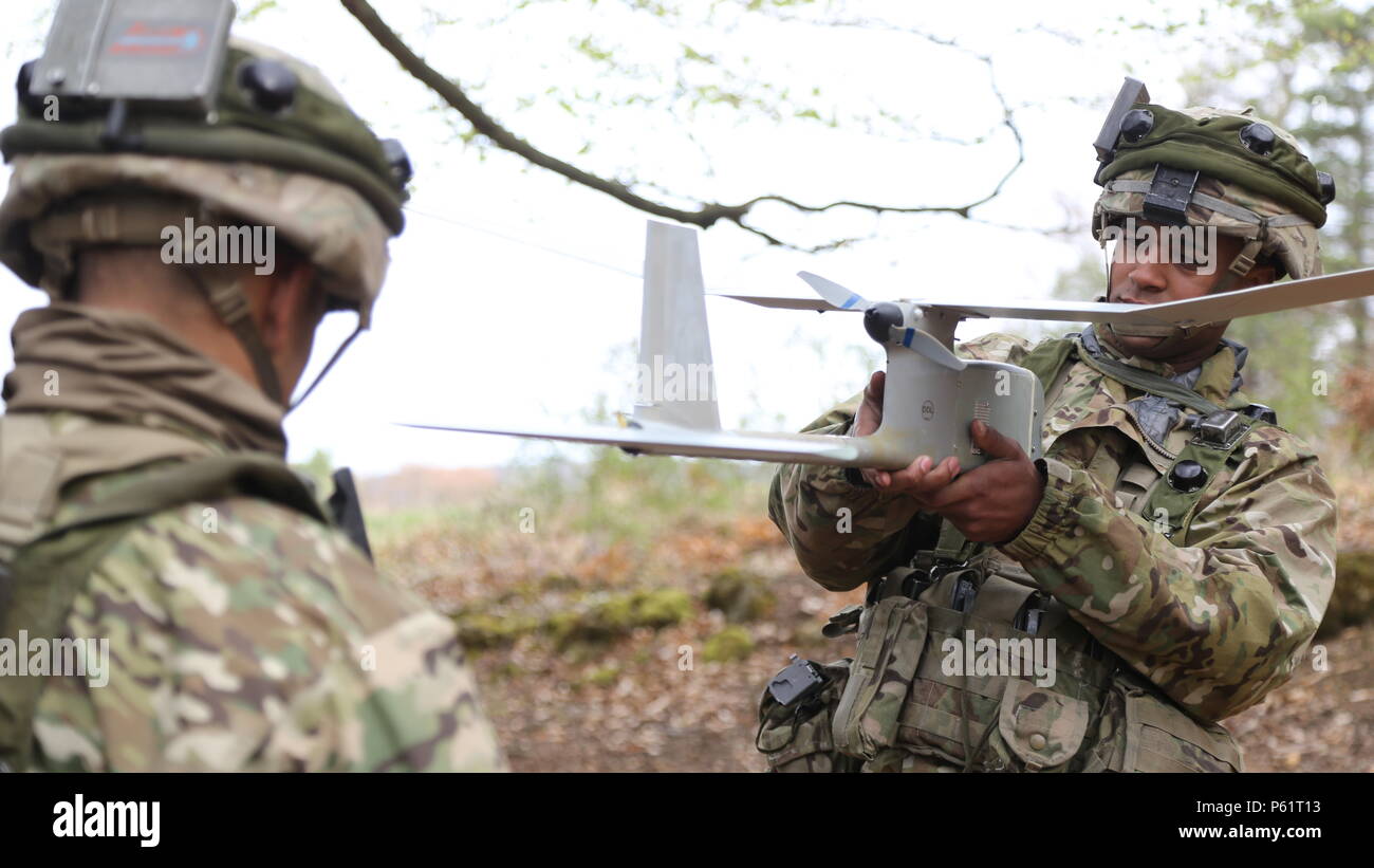 U.S. Soldiers from Bulldog Troop, 1st Squadron, 91st Cavalry Regiment, 173rd Airborne Brigade conduct the pre-flight checks for an unmanned aerial vehicle in a deployment scenario during exercise Saber Junction 16 at the U.S. Army’s Joint Multinational Readiness Center (JMRC) in Hohenfels, Germany, April 13, 2016. Saber Junction 16 is the U.S. Army Europe’s 173rd Airborne Brigade’s combat training center certification exercise, taking place at the JMRC in Hohenfels, Germany, Mar. 31-Apr. 24, 2016.  The exercise is designed to evaluate the readiness of the Army’s Europe-based combat brigades to Stock Photo
