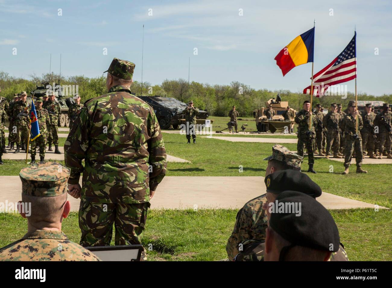 Col. Paul Moglan, the Romanian Deputy Commander of 9th Mechanized Brigade, speaks to U.S. Marines with Black Sea Rotational Force and Romanian soldiers during the opening ceremony for Platinum Lynx 16-4 aboard Babadag Training Area, Romania, April 17, 2016. During Platinum Lynx 16-4, Allies from the United States and Romania will conduct company-level tactics in order to develop proficiency in fire and maneuver.  (U.S. Marine Corps photo by Cpl. Tyler Andersen/Released) Stock Photo