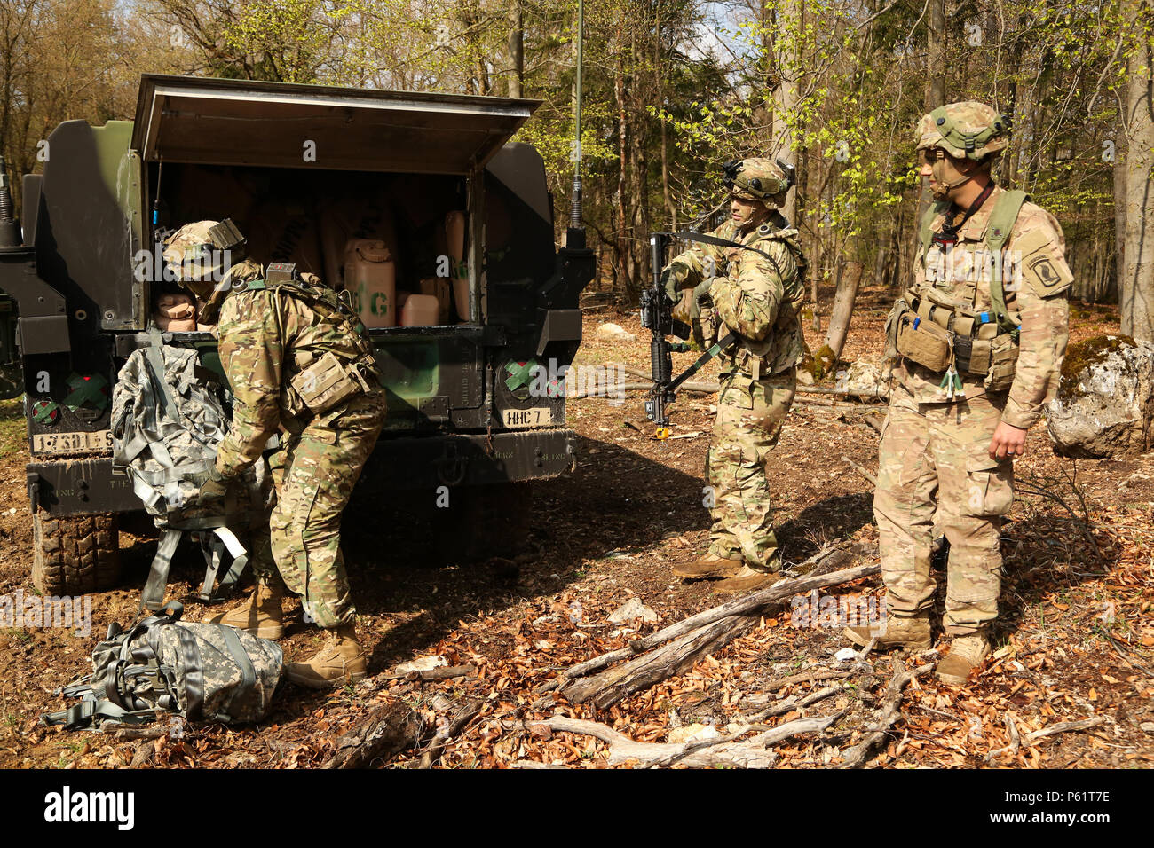 U.S. Soldiers of 1st Battalion, 503rd Infantry Regiment, 173rd Airborne Brigade load up their vehicles with supplies while setting up a scouting position during exercise Saber Junction 16 at the U.S. Army’s Joint Multinational Readiness Center (JMRC) in Hohenfels, Germany, April 14, 2016. Saber Junction 16 is the U.S. Army Europe’s 173rd Airborne Brigade’s combat training center certification exercise, taking place at the JMRC in Hohenfels, Germany, Mar. 31-Apr. 24, 2016.  The exercise is designed to evaluate the readiness of the Army’s Europe-based combat brigades to conduct unified land oper Stock Photo