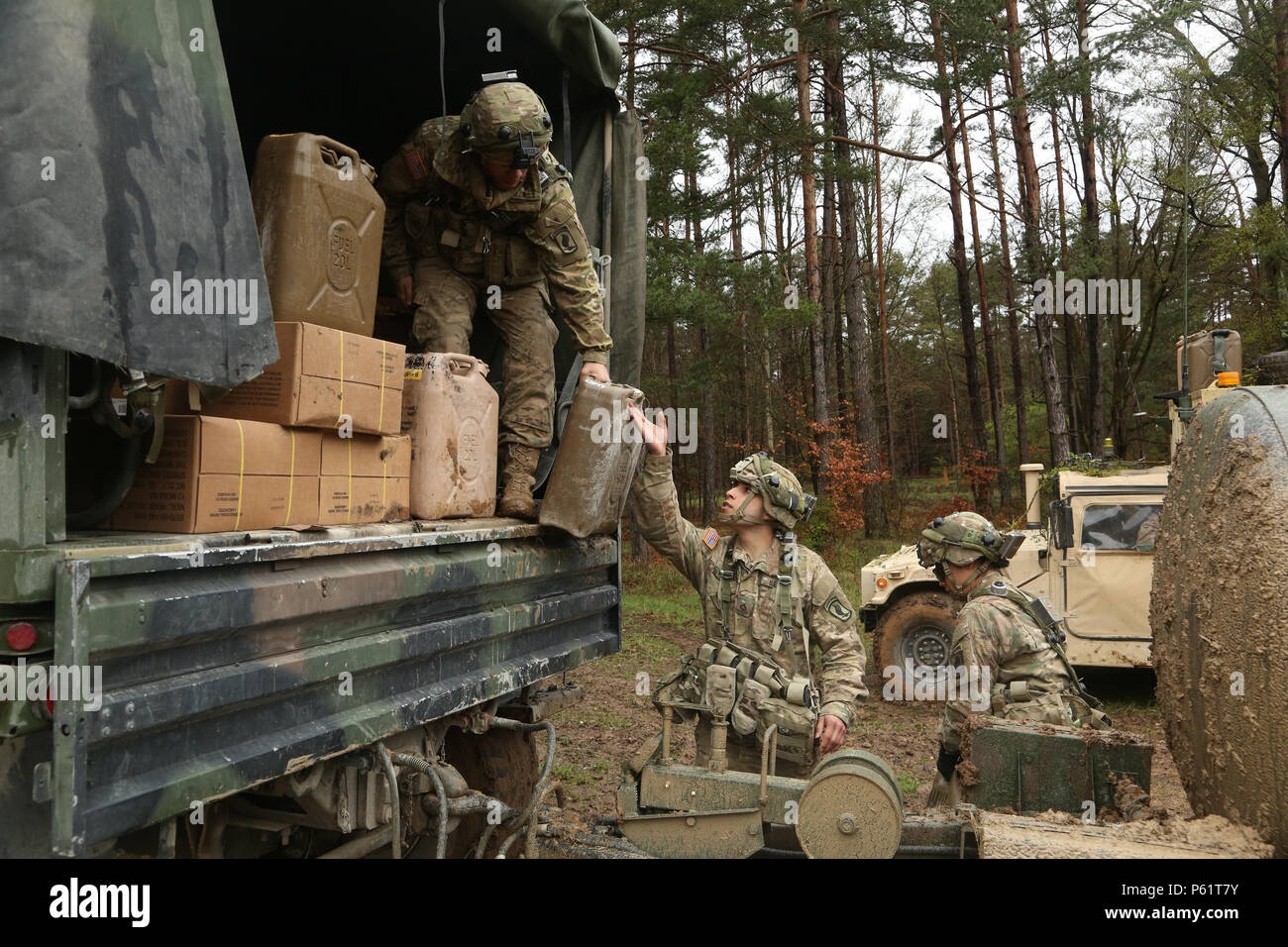 U.S. Soldiers of Delta Troop, 1st Squadron, 91st Cavalry Regiment, 173rd Airborne Brigade unload supplies while conducting a logistical resupply mission during exercise Saber Junction 16 at the U.S. Army’s Joint Multinational Readiness Center (JMRC) in Hohenfels, Germany, April 17, 2016. Saber Junction 16 is the U.S. Army Europe’s 173rd Airborne Brigade’s combat training center certification exercise, taking place at the JMRC in Hohenfels, Germany, Mar. 31-Apr. 24, 2016.  The exercise is designed to evaluate the readiness of the Army’s Europe-based combat brigades to conduct unified land opera Stock Photo