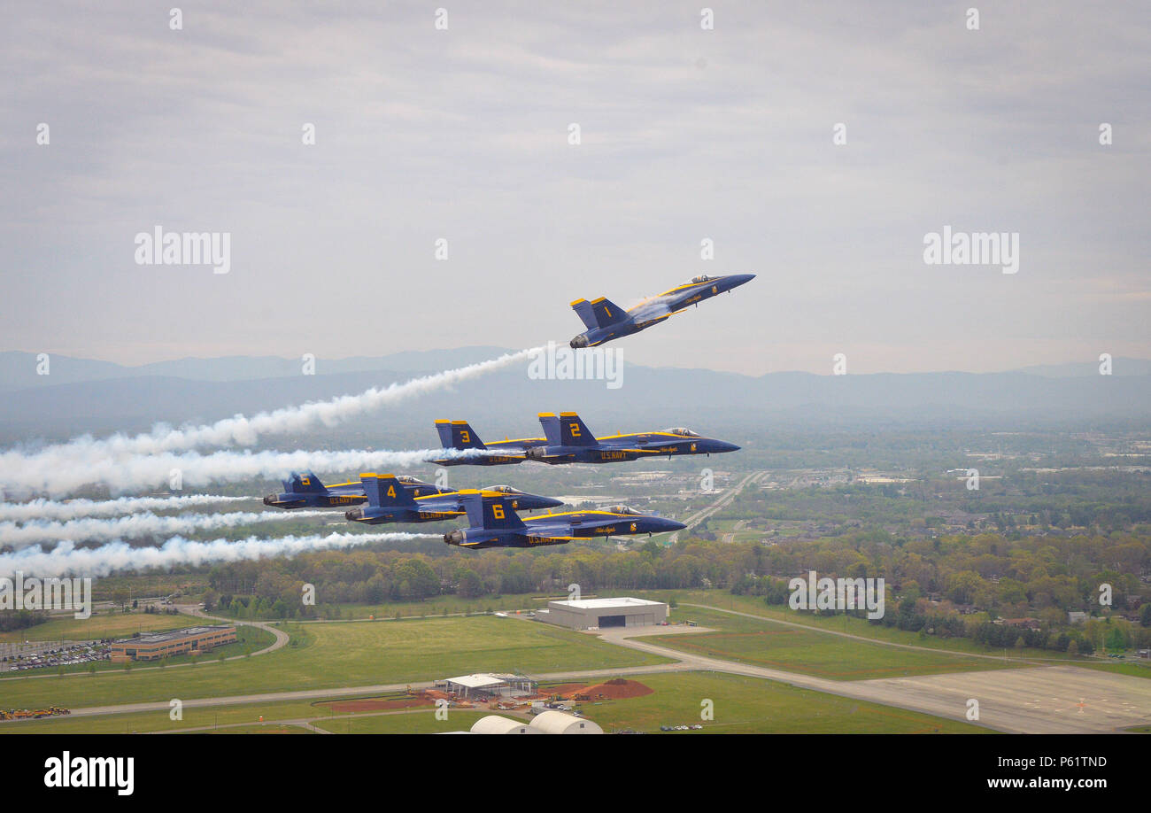 160414-N-NI474-0783 ALCOA, Tennessee (April 14, 2016) U.S. Navy Flight Demonstration Squadron, the Blue Angels, Delta pilots perform the Pitch Up Break at the McGhee Tyson Airport in Alcoa, Tennessee, for the Smoky Mountain Air Show 2016. The Blue Angels are currently celebrating their 70th show season and are schedules to perform 66 demonstrations at 34 locations across the U.S. in 2016. (U.S. Navy photo by Mass Communication Specialist 2nd Class Daniel M. Young/Released) Stock Photo