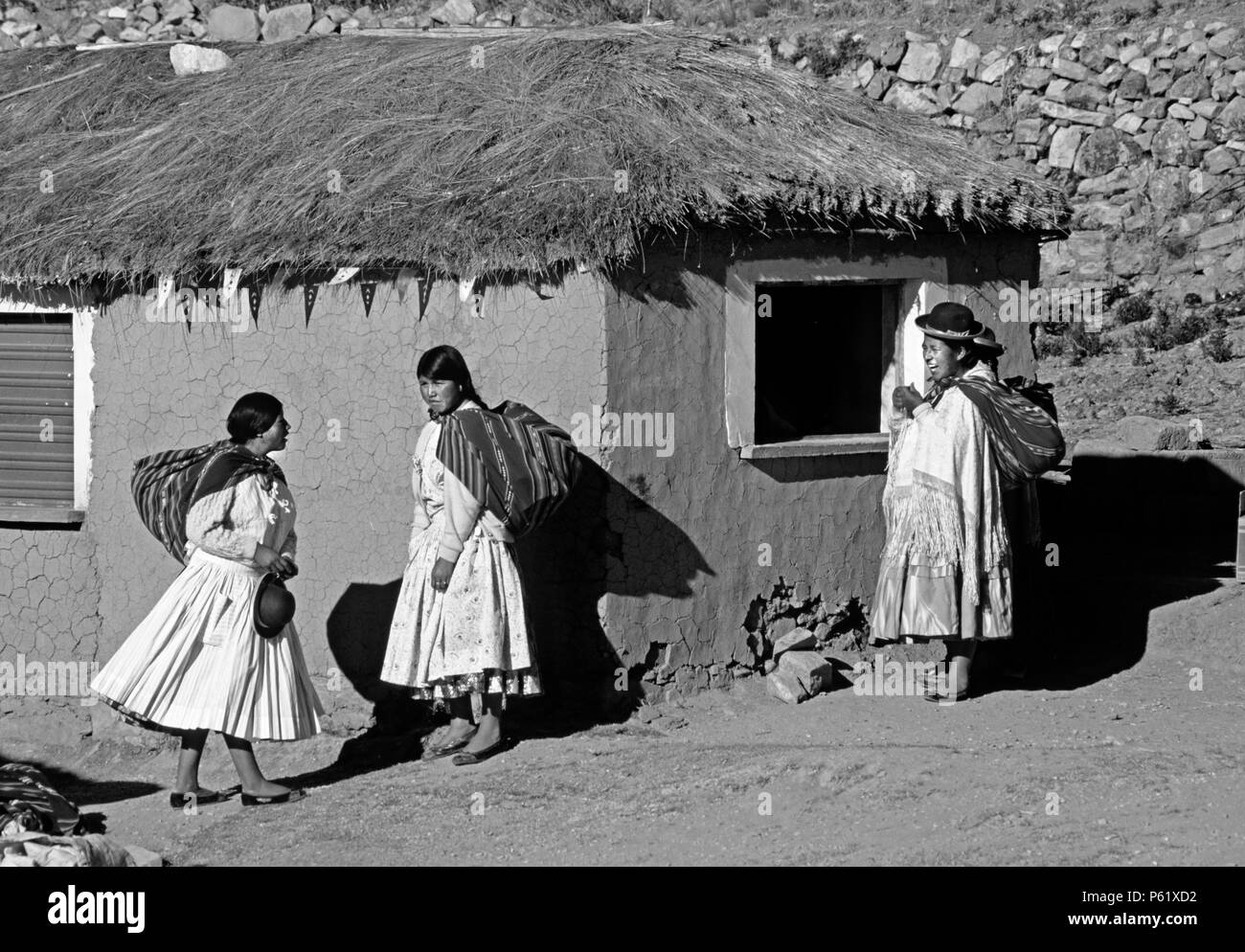 The local AYMARA in their village of YUMANI on ISLE DEL SOL - LAKE TITICACA, BOLIVIA Stock Photo