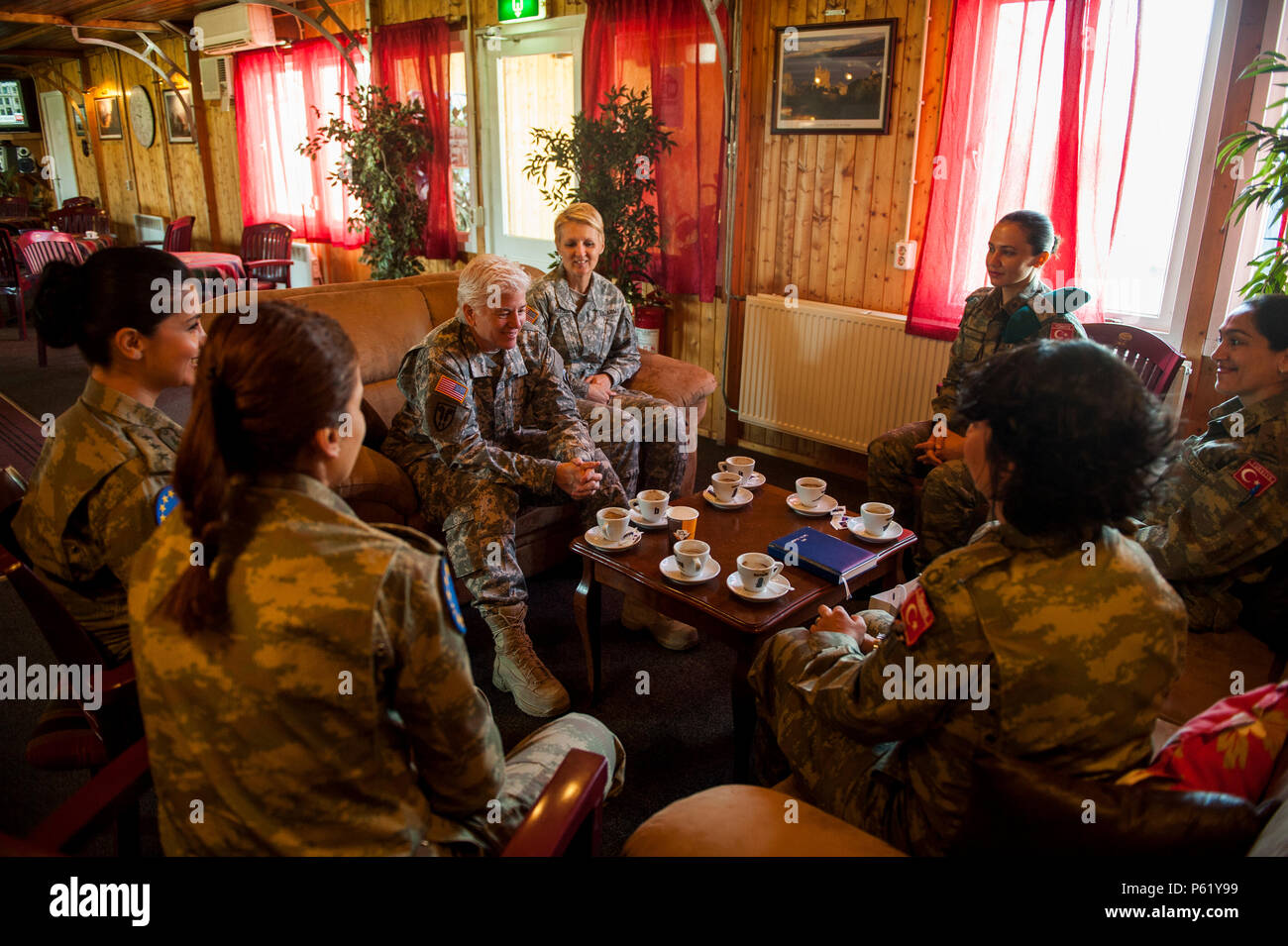 U.S. Army Brig. Gen. Giselle Wilz, commander of the NATO Headquarters Sarajevo, speaks with female officers of the Turkish Land Forces during a mentoring session at Camp Butmir, Bosnia and Herzegovina, April 7, 2016. Wilz discussed cultural differences, women in the military and gave advice on how to be an effective leader. (U.S. Air Force photo by Staff Sgt. Clayton Lenhardt) Stock Photo