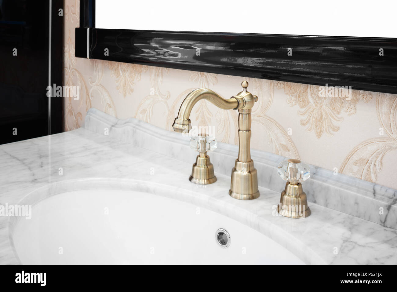 Bathroom interior with sink and retro style faucet Stock Photo - Alamy