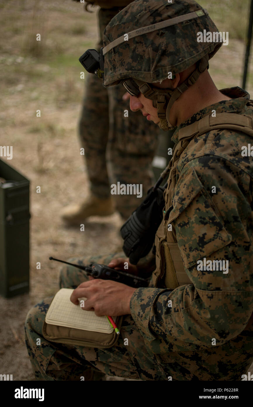U.S. Marines Lance Cpl. Matthew J. Spearman, ammo man, 2nd battalion 2nd Marines, 81st platoon, with 2nd Marine Division looks at his log book at Crow Valley, Philippines, on April 5, 2016. U.S. and Philippine Marines integrated together to fire 81 mm Mortar Systems. Balikatan is an annual Philippines-U.S. military bilateral training exercise that is a signature element of the Philippine-U.S. alliance focused on a variety of missions to include humanitarian assistance maritime law enforcement, and environment protection. (U.S. Marine Corps photo by Lance Cpl. Cameron Darrough/Released) Stock Photo