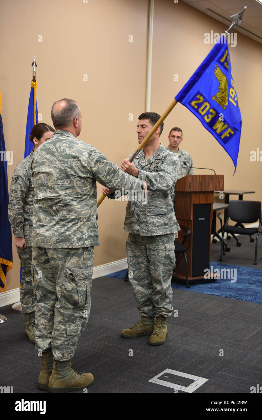 Maj. Aaron Doriani (right), commander, 203rd Weather Flight, Fort