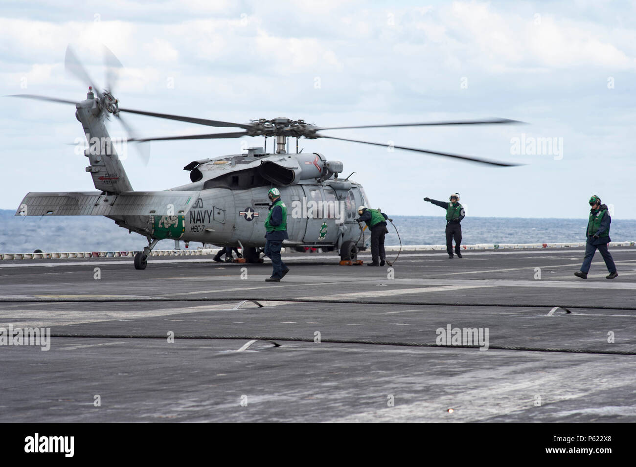 Sailors from Helicopter Sea Combat Squadron (HSC) 7, known as the Dusty ...