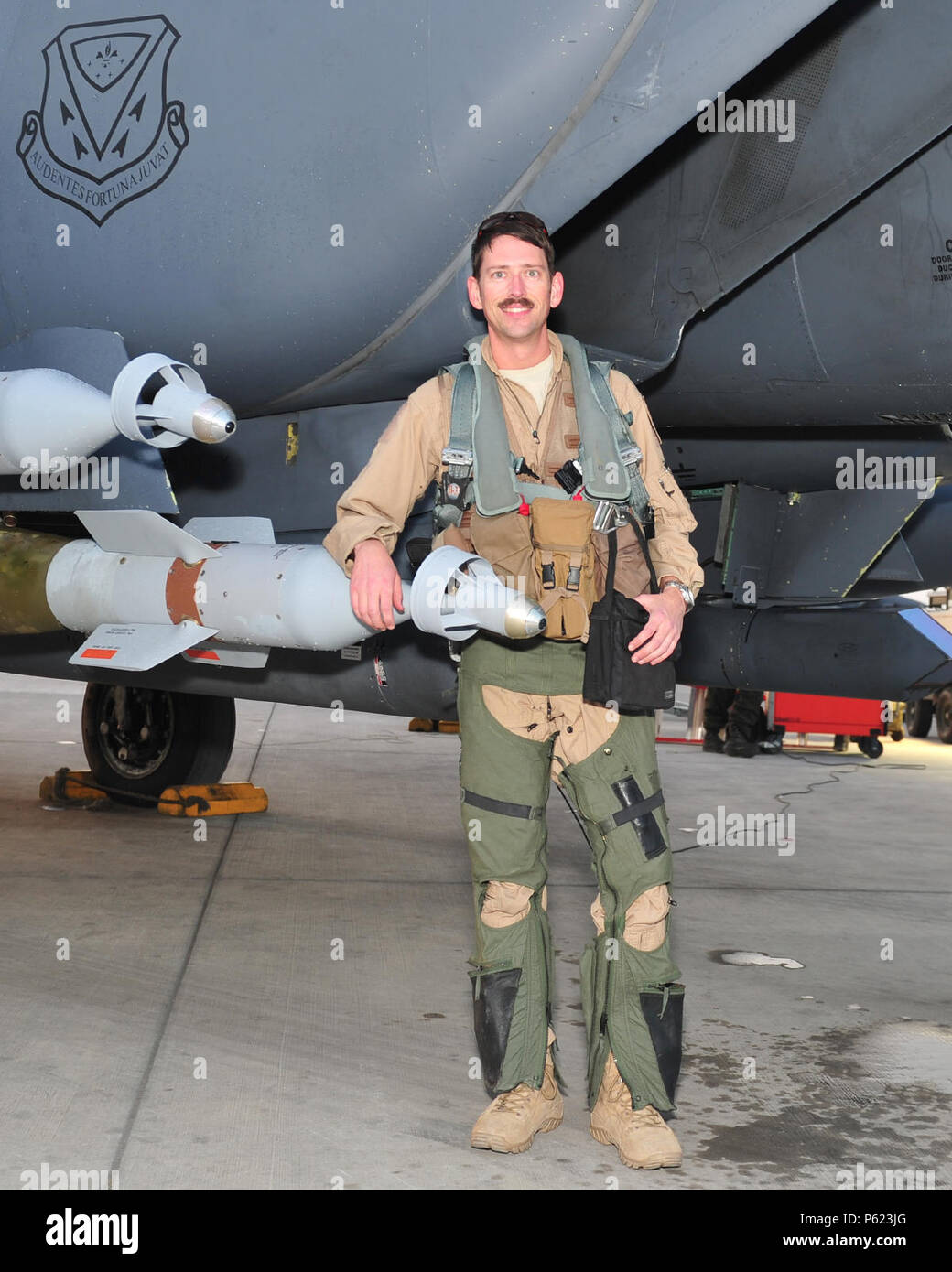 Lt Col Bash 391st Expeditionary Fighter Squadron Weapons System Officer And Instructor Poses For A Photo With An F 15e Strike Eagle Fighter Aircraft After Returning From His 1 000 Combat Flying Hour Milestone