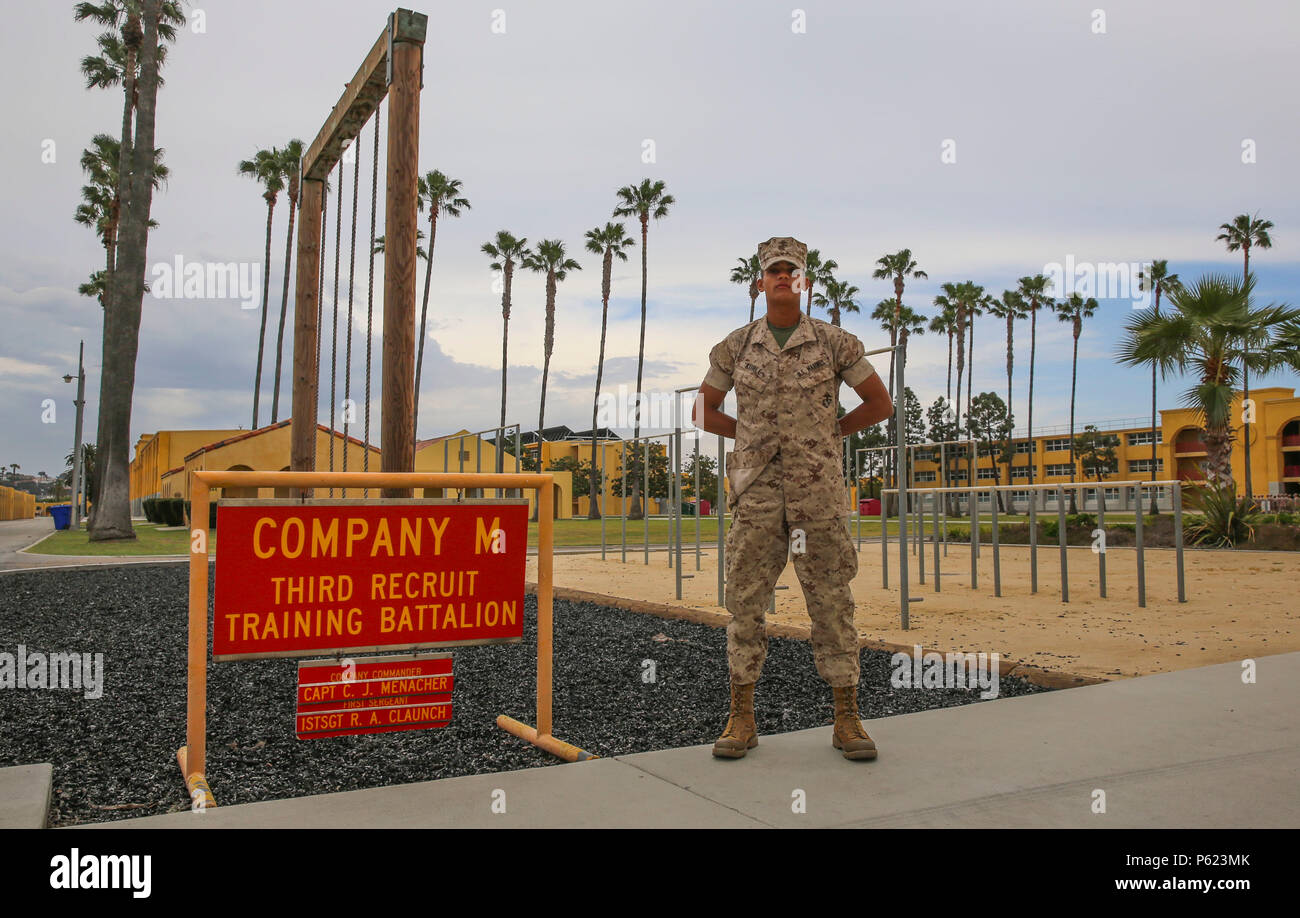 Private First Class Jakob S. Kurle, Mike Company, 3rd Recruit Training Battalion, stands next to his squad bay at Marine Corps Recruit Depot San Diego, April 11. Following recruit training, Kurle will report to the School of Infantry at Marine Corps Base Camp Pendleton, Calif., and then to his military occupational specialty school to become a combat engineer. Annually, more than 17,000 males recruited from the Western Recruiting Region are trained at MCRD San Diego. Stock Photo