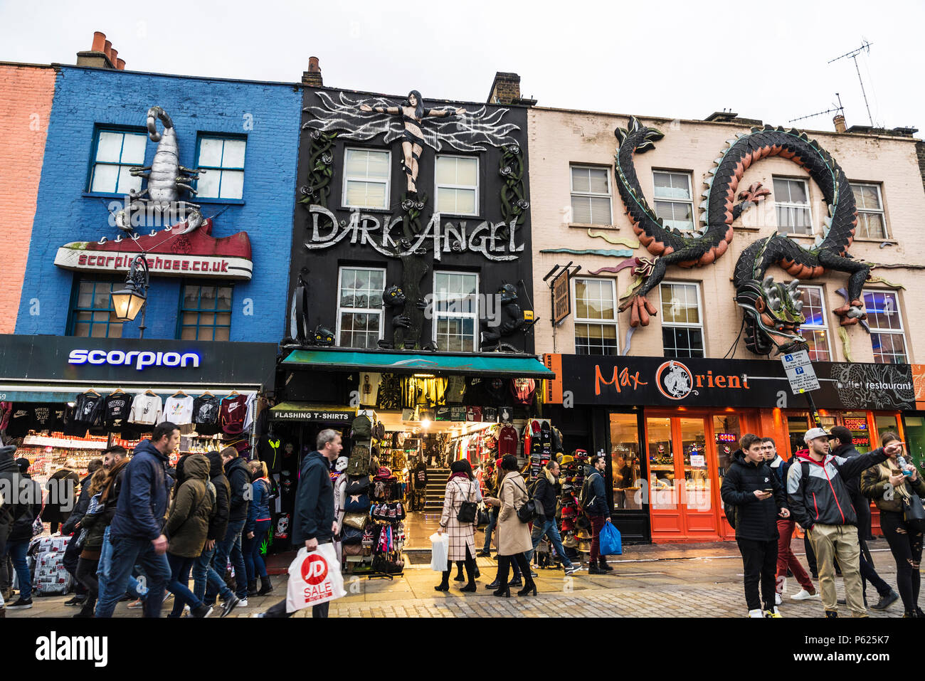 London, England UK  - December 31, 2017: People walking down the fashion shops of Camden High Street in Camden Lock or Camden Town in London, England, Stock Photo
