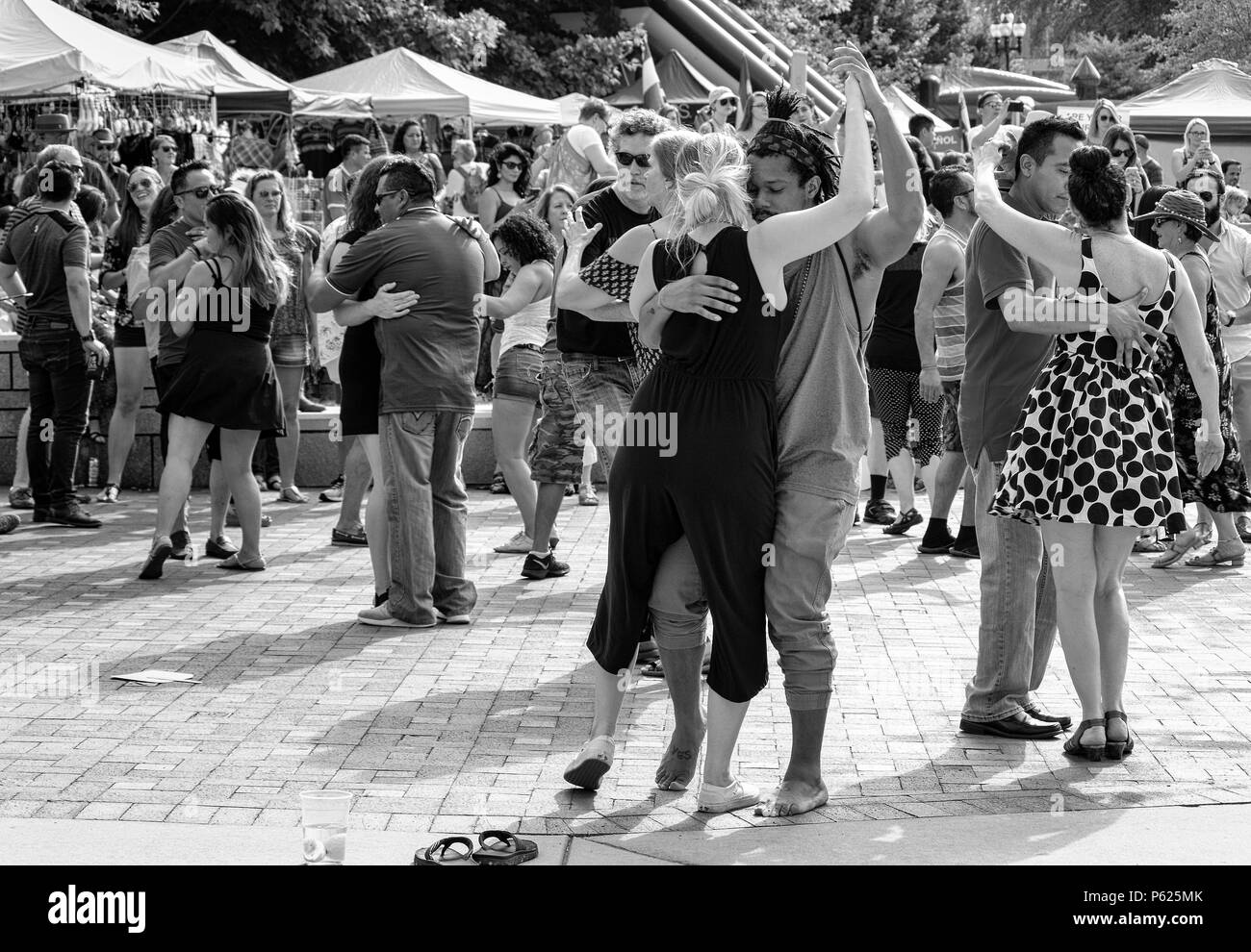 Couples dance at the Hola Asheville Festival, celebrating Latin American culture, in Asheville, NC, USa Stock Photo